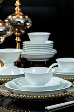 58头青瓷浮雕云揽群山餐具 · 2