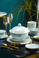 58件青瓷镶金沐浴花涧餐具（白瓷） · 2